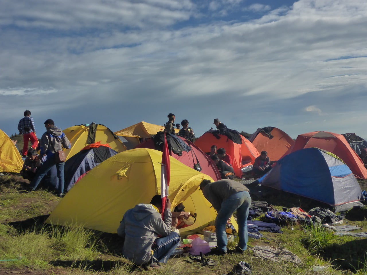 People setting up their camping gear