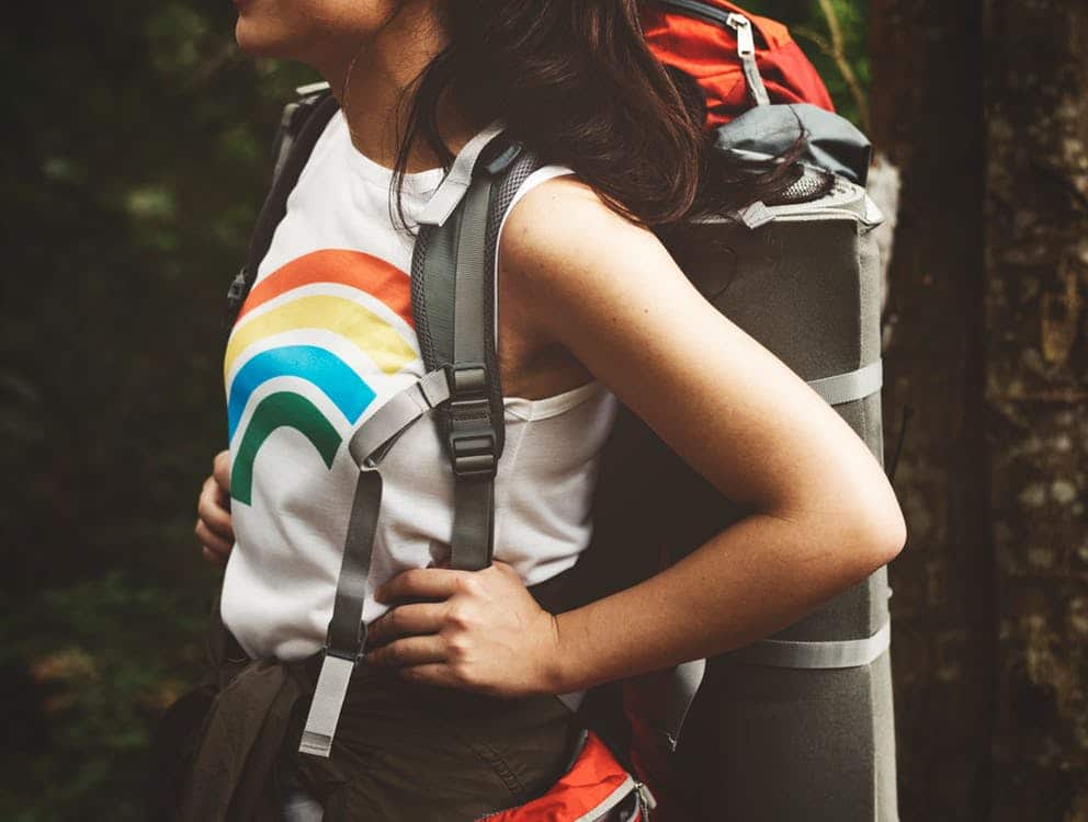 close up photo of woman wearing a backpack