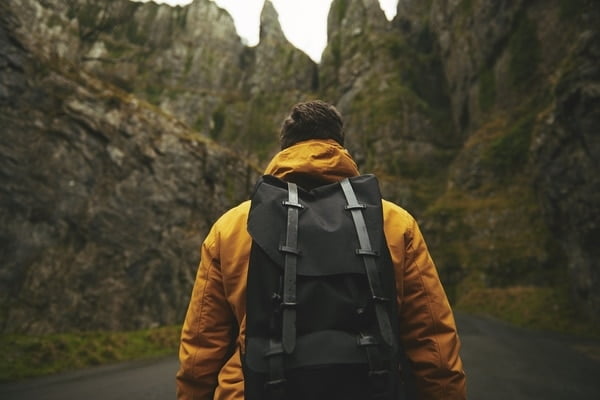 guy hiking with backpack